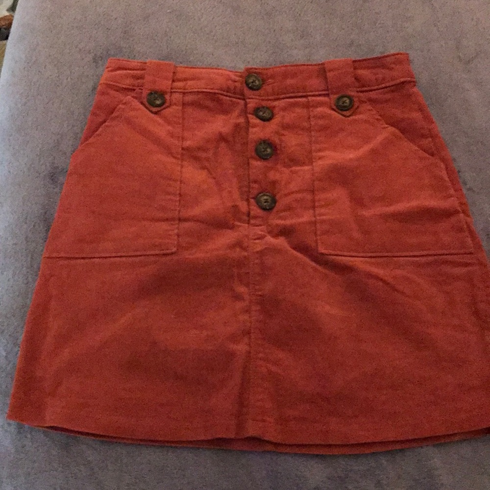 Orange skirt with buttons